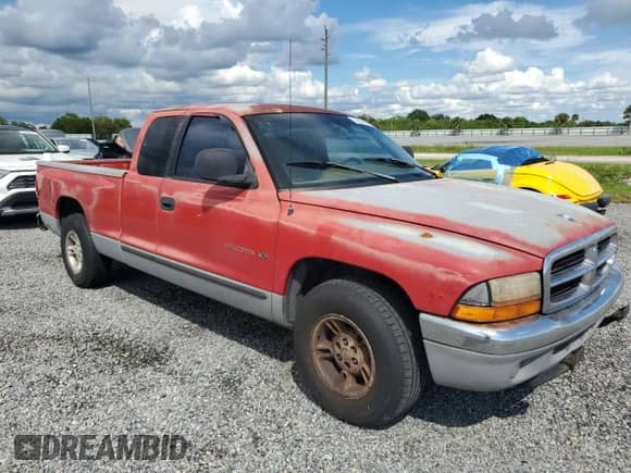 1998 Dodge Dakota SLT z VIN 1B7GL22Y4WS511292, wystawiony jako Copart lot #74064374 z przebiegiem Nie podano mil oraz Szkoda całkowita • Salvage title. Historia ofert i sprzedaży dostępna na DreamBid. Obrazek 4.