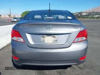 2013 Hyundai Accent GLS z VIN KMHCT4AE0DU554039, wystawiony jako IAAI lot #43491661 z przebiegiem 170 415 mil mil oraz . Historia ofert i sprzedaży dostępna na DreamBid. Obrazek 6.