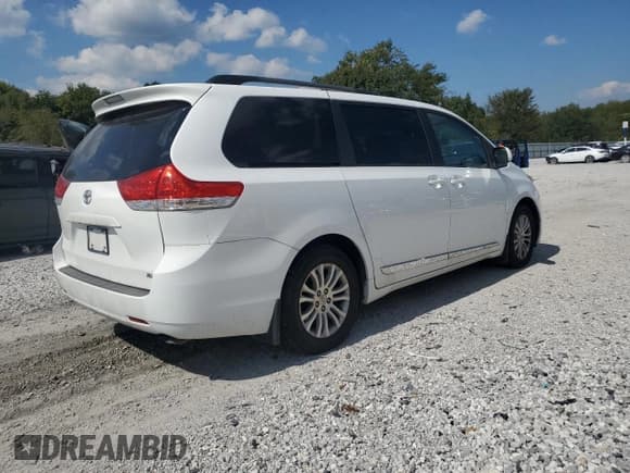 ✅ 2012 Toyota Sienna XLE AAS • VIN: 5TDYK3DC9CS220211 • Lot: 84572105. Listed on Copart with 150,916 mi. Free auction sales archive from the USA and detailed vehicle history report at DreamBid. Image 3.