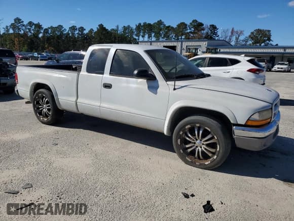 ✅ 2004 Dodge Dakota SLT • VIN: 1D7GL42N44S745131 • Lot: 92236385. Listed on Copart with Not provided. Free auction sales archive from the USA and detailed vehicle history report at DreamBid. Image 4.