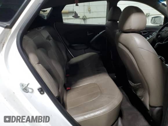 2014 Hyundai Tucson Limited z VIN KM8JUCAG5EU940764, wystawiony jako Copart lot #83760535 z przebiegiem 188 447 mil mil oraz Czysty tytuł • Clean title. Historia ofert i sprzedaży dostępna na DreamBid. Obrazek 11.