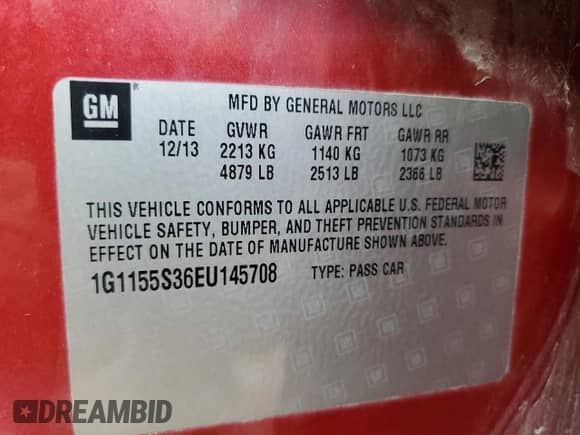 2014 Chevrolet Impala LTZ with VIN 1G1155S36EU145708, listed as a Copart auction lot 82423055 with 140,731 mi miles and Salvage title. Bid and sale history available at DreamBid. Image 12.