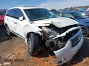 ✅ 2014 Infiniti QX60 • VIN: 5N1AL0MNXEC513663 • Lot: 41610624. Listed on IAAI with 188,055 mi. Free auction sales archive from the USA and detailed vehicle history report at DreamBid. Image 1.