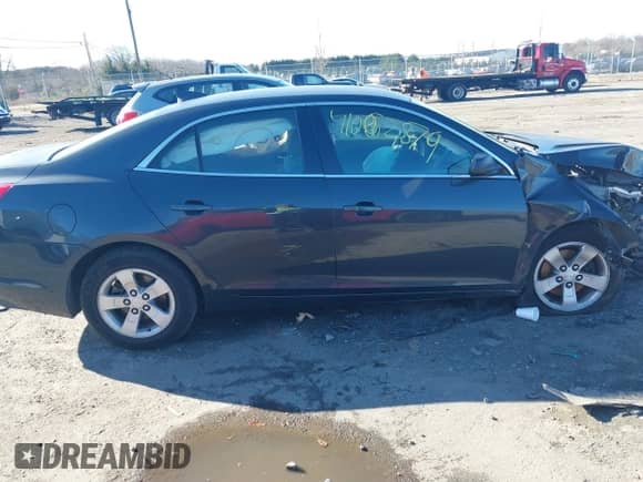 2016 Chevrolet Malibu LS with VIN 1G11A5SA3GU139992, listed as a IAAI auction lot 41062879 with 121,720 mi miles and . Bid and sale history available at DreamBid. Image 14.