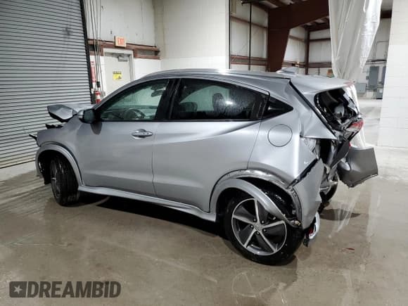 ✅ 2019 Honda HR-V Touring • VIN: 3CZRU6H94KM713897 • Лот: 70648005. Опубликован ранее на Copart с пробегом 94 754 миль. Бесплатный доступ к архиву аукционных продаж из США и подробный отчёт об истории автомобиля на DreamBid. Изображение 2.