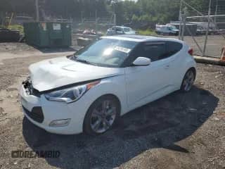 2012 Hyundai Veloster w/Red Int с VIN KMHTC6AD5CU058901, выставлен на аукционе Copart как лот 69244165 с пробегом 97 260 миль миль и Списание • Salvage title. История ставок и продаж доступна на DreamBid. Изображение 1.