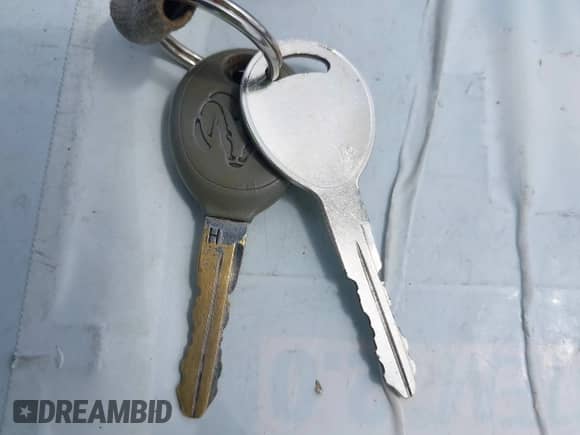 2005 Dodge Neon SXT z VIN 1B3ES56C05D180578, wystawiony jako IAAI lot #42304117 z przebiegiem Nie podano mil oraz . Historia ofert i sprzedaży dostępna na DreamBid. Obrazek 11.