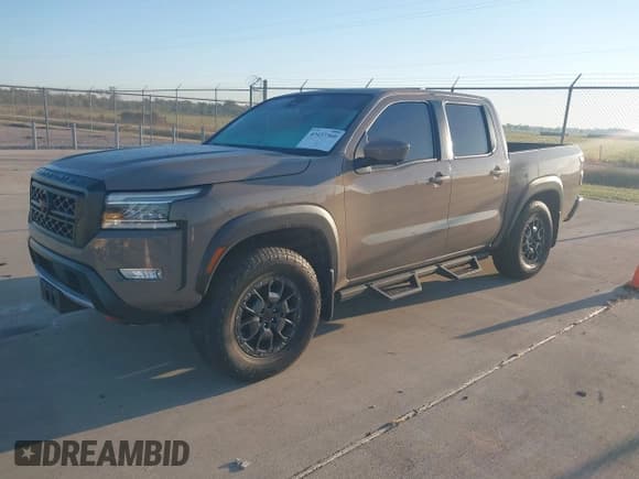✅ 2023 Nissan Frontier Pro-4X • VIN: 1N6ED1EK4PN674379 • Lot: 43437360. Listed on IAAI with 24,855 mi. Free auction sales archive from the USA and detailed vehicle history report at DreamBid. Image 2.