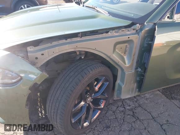 2022 Dodge Charger SXT with VIN 2C3CDXBG5NH202361, listed as a IAAI auction lot 43406992 with 34,449 mi miles and . Bid and sale history available at DreamBid. Image 6.