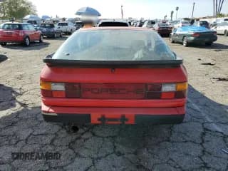 ✅ 1986 Porsche 944 • VIN: WP0AA0943GN450410 • Лот: 45217525. Опубликован ранее на Copart с пробегом 94 861 миль. Бесплатный доступ к архиву аукционных продаж из США и подробный отчёт об истории автомобиля на DreamBid. Изображение 6.