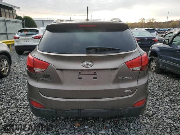 2013 Hyundai Tucson GLS z VIN KM8JUCAC5DU564904, wystawiony jako Copart lot #91123035 z przebiegiem 171 088 mil mil oraz Czysty tytuł • Clean title. Historia ofert i sprzedaży dostępna na DreamBid. Obrazek 6.