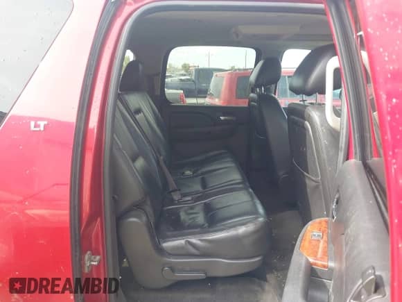 2013 Chevrolet Suburban LT z VIN 1GNSKJE77DR205791, wystawiony jako IAAI lot #43091004 z przebiegiem 184 633 mil mil oraz . Historia ofert i sprzedaży dostępna na DreamBid. Obrazek 8.