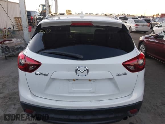 ✅ 2016 Mazda CX-5 Grand Touring • VIN: JM3KE2DY3G0863303 • Lot: 43848862. Wystawiony na IAAI z przebiegiem 95 498 mil. Bezpłatny archiwum sprzedaży aukcyjnych z USA i szczegółowy raport historii pojazdu na DreamBid. Zdjęcie 16.