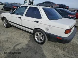 ✅ 1991 Nissan Sentra E • VIN: JN1EB31P5MU009114 • Лот: 46682315. Опубликован ранее на Copart с пробегом 242 062 миль. Бесплатный доступ к архиву аукционных продаж из США и подробный отчёт об истории автомобиля на DreamBid. Изображение 2.