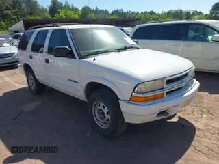 2003 Chevrolet Blazer LS z VIN 1GNDT13X53K152850, wystawiony jako IAAI lot #41982795 z przebiegiem 261 155 mil mil oraz . Historia ofert i sprzedaży dostępna na DreamBid. Obrazek 1.