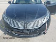 ✅ 2014 Lincoln MKZ Hybrid • VIN: 3LN6L2LU3ER804887 • Lot: 43212099. Listed on IAAI with 195,399 mi. Free auction sales archive from the USA and detailed vehicle history report at DreamBid. Image 6.