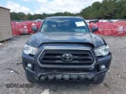 ✅ 2020 Toyota Tacoma SR5 • VIN: 3TMAZ5CN0LM129386 • Lot: 43242623. Listed on IAAI with 35,673 mi. Free auction sales archive from the USA and detailed vehicle history report at DreamBid. Image 12.