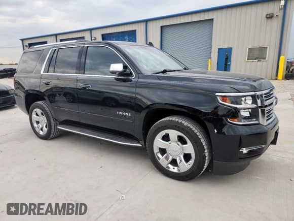 2020 Chevrolet Tahoe Premier z VIN 1GNSCCKC8LR188993, wystawiony jako Copart lot #60122655 z przebiegiem 103 415 mil mil oraz Czysty tytuł • Clean title. Historia ofert i sprzedaży dostępna na DreamBid. Obrazek 4.
