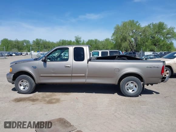 ✅ 2002 Ford F-150 XL • VIN: 2FTRX18W32CA77183 • Lot: 42220490. Listed on IAAI with 145,906 mi. Free auction sales archive from the USA and detailed vehicle history report at DreamBid. Image 14.