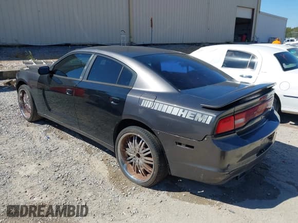 ✅ 2014 Dodge Charger Police • VIN: 2C3CDXAT9EH132958 • Lot: 43385394. Listed on IAAI with 193,287 mi. Free auction sales archive from the USA and detailed vehicle history report at DreamBid. Image 3.