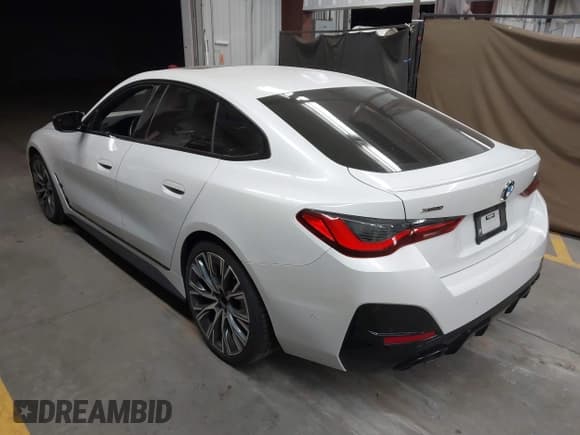 ✅ 2022 BMW 4 Series M440i xDrive • VIN: WBA13AW02NFM31207 • Lot: 43516906. Listed on IAAI with 21,680 mi. Free auction sales archive from the USA and detailed vehicle history report at DreamBid. Image 3.