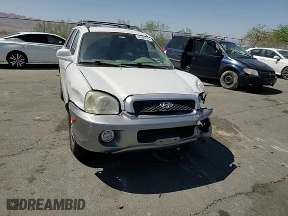 ✅ 2004 Hyundai Santa Fe GLS • VIN: KM8SC13E84U713106 • Lot: 61865775. Listed on Copart with 174,358 mi. Free auction sales archive from the USA and detailed vehicle history report at DreamBid. Image 13.