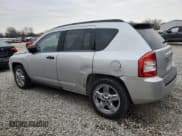 ✅ 2009 Jeep Compass • VIN: 1J8FT57B99D209998 • Lot: 82871464. Wystawiony na Copart z przebiegiem 61 068 mil. Bezpłatny archiwum sprzedaży aukcyjnych z USA i szczegółowy raport historii pojazdu na DreamBid. Zdjęcie 2.