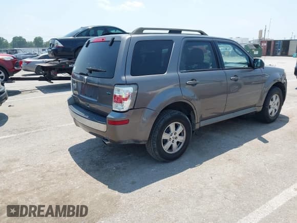 ✅ 2010 Mercury Mariner • VIN: 4M2CN8BG8AKJ19762 • Lot: 42466703. Listed on IAAI with 240,178 mi. Free auction sales archive from the USA and detailed vehicle history report at DreamBid. Image 4.