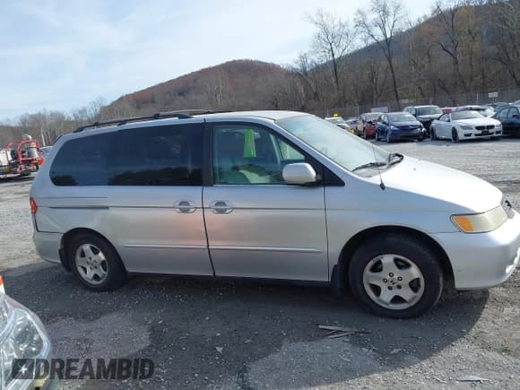 ✅ 2001 Honda Odyssey EX • VIN: 2HKRL18611H601564 • Lot: 43683828. Listed on IAAI with 184,613 mi. Free auction sales archive from the USA and detailed vehicle history report at DreamBid. Image 13.