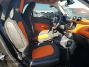 ✅ 2016 Smart fortwo Passion • VIN: WMEFJ5DA6GK069556 • Lot: 71427185. Wystawiony na Copart z przebiegiem 43 435 mil. Bezpłatny archiwum sprzedaży aukcyjnych z USA i szczegółowy raport historii pojazdu na DreamBid. Zdjęcie 10.