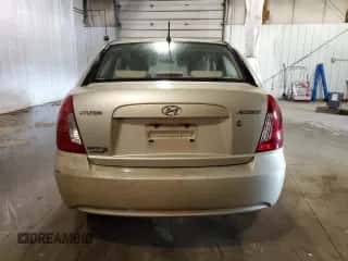 2007 Hyundai Accent GLS with VIN KMHCN46C87U103169, listed as a Copart auction lot 70390484 with 129,702 mi miles and Salvage title. Bid and sale history available at DreamBid. Image 6.