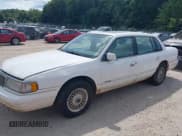 ✅ 1994 Lincoln Continental • VIN: 1LNLM9842RY744934 • Lot: 43040364. Listed on IAAI with Not provided. Free auction sales archive from the USA and detailed vehicle history report at DreamBid. Image 2.