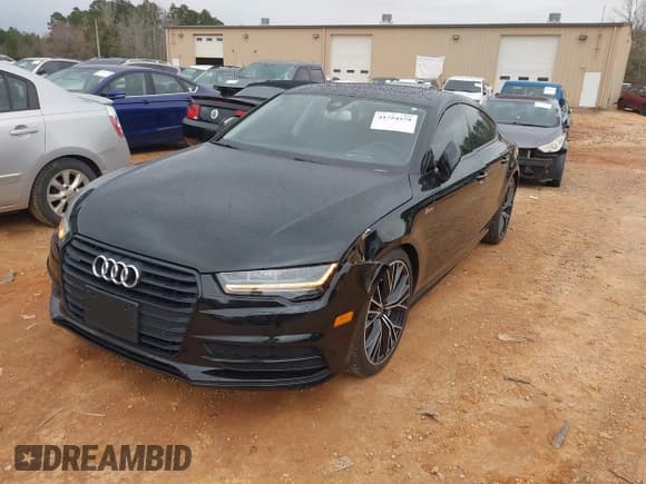 ✅ 2016 Audi A7 Prestige • VIN: WAU2GAFC5GN008438 • Lot: 41754579. Listed on IAAI with 122,794 mi. Free auction sales archive from the USA and detailed vehicle history report at DreamBid. Image 2.