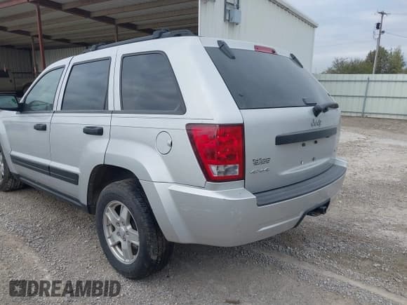 ✅ 2005 Jeep Grand Cherokee Laredo • VIN: 1J4GR48K95C661219 • Lot: 43694482. Listed on IAAI with 156,190 mi. Free auction sales archive from the USA and detailed vehicle history report at DreamBid. Image 15.