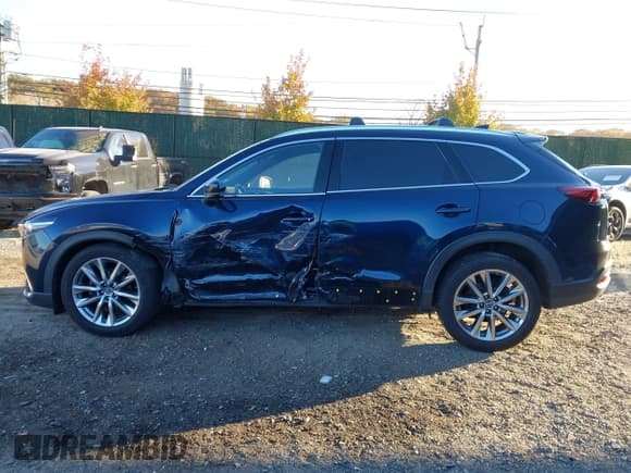 ✅ 2018 Mazda CX-9 Grand Touring • VIN: JM3TCBDY4J0205815 • Lot: 43539581. Wystawiony na IAAI z przebiegiem 100 779 mil. Bezpłatny archiwum sprzedaży aukcyjnych z USA i szczegółowy raport historii pojazdu na DreamBid. Zdjęcie 15.