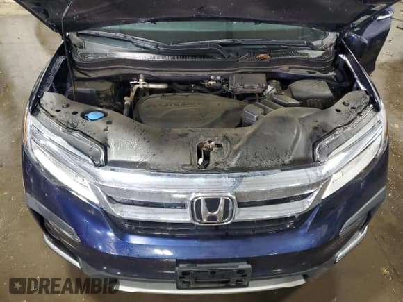 ✅ 2022 Honda Pilot Touring 8-Passenger • VIN: 5FNYF6H95NB034032 • Lot: 85515885. Listed on Copart with 42,443 mi. Free auction sales archive from the USA and detailed vehicle history report at DreamBid. Image 12.