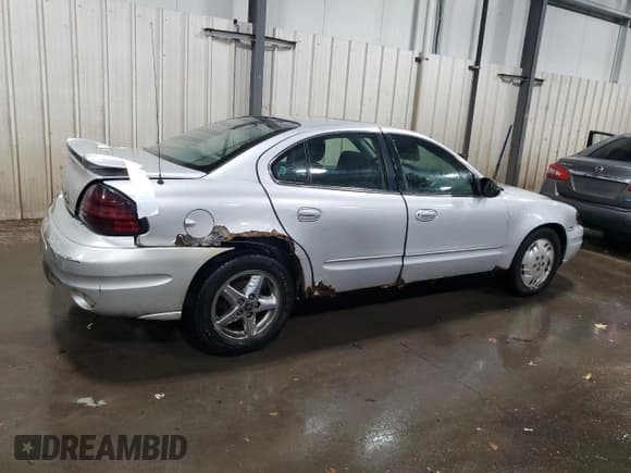 ✅ 2003 Pontiac Grand Am SE1 • VIN: 1G2NF52E13C219471 • Lot: 92613245. Listed on Copart with 272,107 mi. Free auction sales archive from the USA and detailed vehicle history report at DreamBid. Image 3.