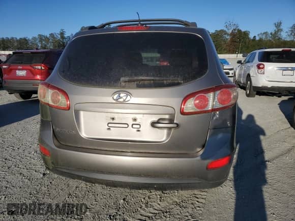 2012 Hyundai Santa Fe GLS z VIN 5XYZG3AB0CG122036, wystawiony jako Copart lot #76293294 z przebiegiem 182 407 mil mil oraz Czysty tytuł • Clean title. Historia ofert i sprzedaży dostępna na DreamBid. Obrazek 6.