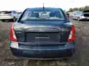 2009 Hyundai Accent L z VIN KMHCN45C79U345472, wystawiony jako Copart lot #75500404 z przebiegiem 143 940 mil mil oraz Czysty tytuł • Clean title. Historia ofert i sprzedaży dostępna na DreamBid. Obrazek 6.