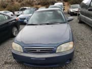 ✅ 2003 Kia Spectra • VIN: KNAFB121135283707 • Lot: 71500884. Wystawiony na Copart z przebiegiem 165 245 mil. Bezpłatny archiwum sprzedaży aukcyjnych z USA i szczegółowy raport historii pojazdu na DreamBid. Zdjęcie 5.