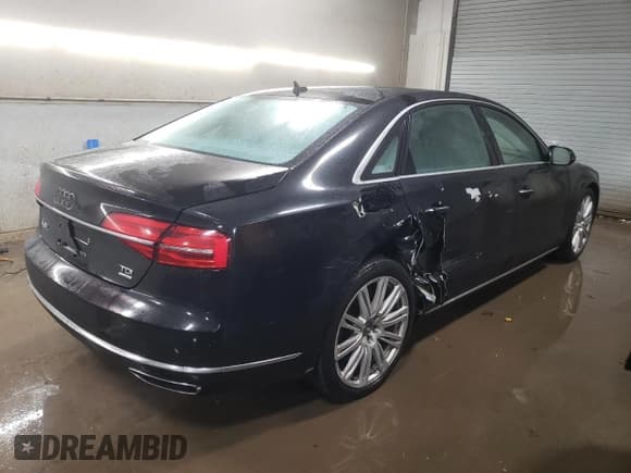 ✅ 2015 Audi A8 3.0L TDI • VIN: WAU3MAFD1FN026648 • Лот: 83956804. Опубликован ранее на Copart с пробегом 171 089 миль. Бесплатный доступ к архиву аукционных продаж из США и подробный отчёт об истории автомобиля на DreamBid. Изображение 3.