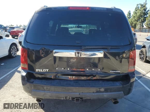 ✅ 2009 Honda Pilot Touring • VIN: 5FNYF38859B024418 • Lot: 87062005. Listed on Copart with 147,844 mi. Free auction sales archive from the USA and detailed vehicle history report at DreamBid. Image 6.