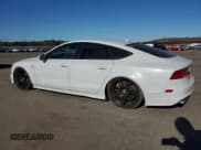 ✅ 2014 Audi S7 Prestige • VIN: WAUW2AFC2EN047713 • Lot: 79287844. Listed on Copart with 104,410 mi. Free auction sales archive from the USA and detailed vehicle history report at DreamBid. Image 2.