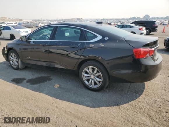 ✅ 2017 Chevrolet Impala LT • VIN: 1G1105S35HU150580 • Лот: 71301794. Опубликован ранее на Copart с пробегом 165 318 миль. Бесплатный доступ к архиву аукционных продаж из США и подробный отчёт об истории автомобиля на DreamBid. Изображение 2.