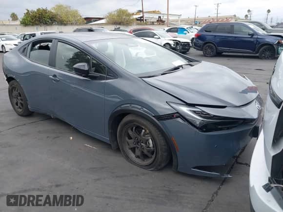 2024 Toyota Prius LE with VIN JTDACAAU6R3046057, listed as a IAAI auction lot 43316816 with 14,220 mi miles and . Bid and sale history available at DreamBid. Image 1.