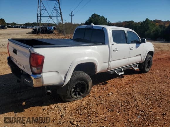 ✅ 2017 Toyota Tacoma SR5 • VIN: 5TFBZ5DN9HX001927 • Lot: 82623785. Listed on Copart with 130,642 mi. Free auction sales archive from the USA and detailed vehicle history report at DreamBid. Image 3.
