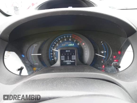 ✅ 2013 Honda Insight • VIN: JHMZE2H30DS003797 • Lot: 43580287. Listed on IAAI with 104,858 mi. Free auction sales archive from the USA and detailed vehicle history report at DreamBid. Image 7.