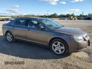 ✅ 2012 Chevrolet Malibu 1LS • VIN: 1G1ZB5E04CF328975 • Lot: 75605814. Listed on Copart with 112,288 mi. Free auction sales archive from the USA and detailed vehicle history report at DreamBid. Image 4.
