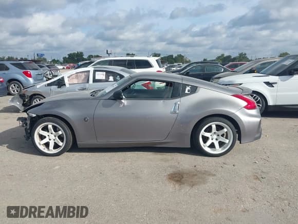 ✅ 2009 Nissan 370Z Touring • VIN: JN1AZ44E19M401251 • Lot: 43281911. Listed on IAAI with 136,374 mi. Free auction sales archive from the USA and detailed vehicle history report at DreamBid. Image 14.