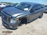 ✅ 2017 Nissan Titan SV • VIN: 1N6AA1E55HN551578 • Lot: 42392063. Listed on IAAI with 123,077 mi. Free auction sales archive from the USA and detailed vehicle history report at DreamBid. Image 2.